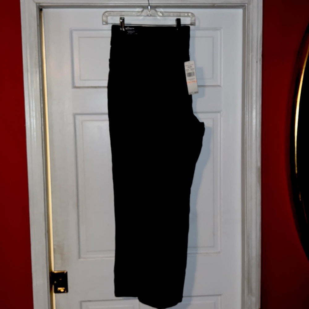 Professional, clean, never worn pants. Black with a denim feel.